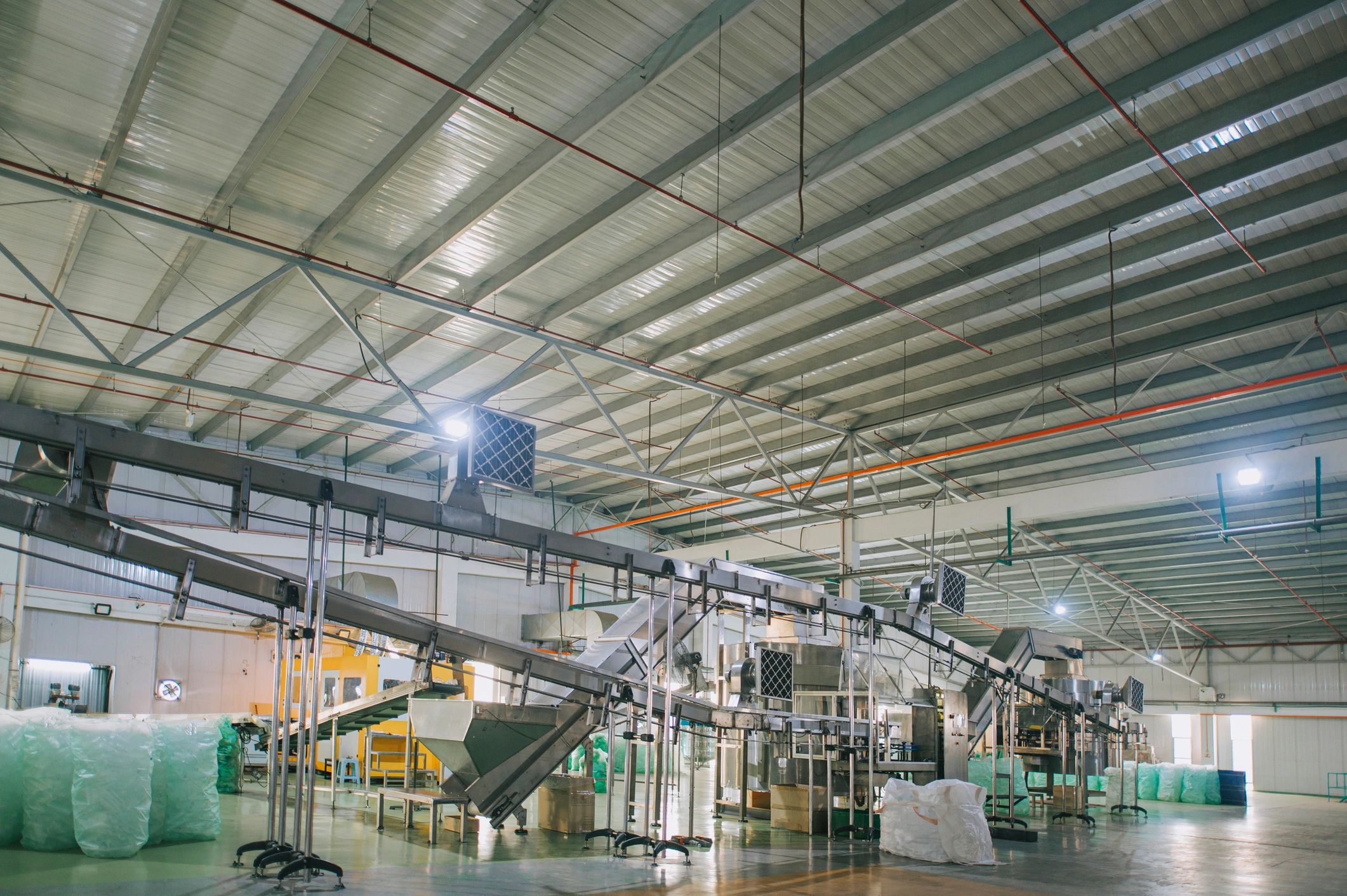 Production line inside a processing facility representing agro-processing operations