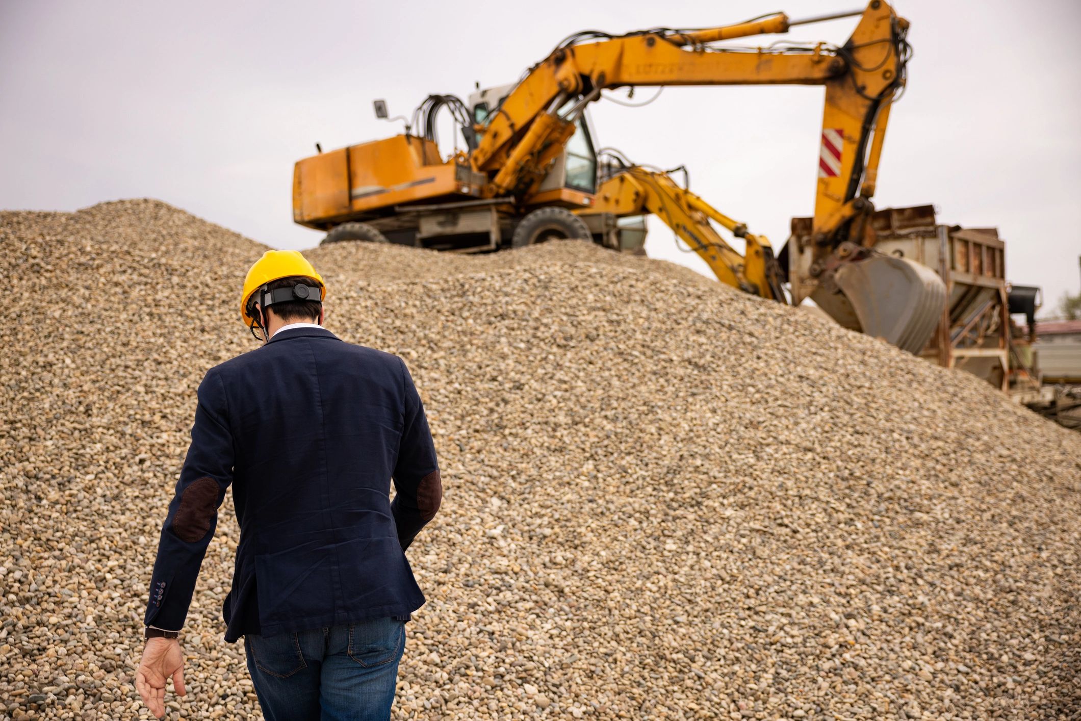 Operator overseeing sand separation site