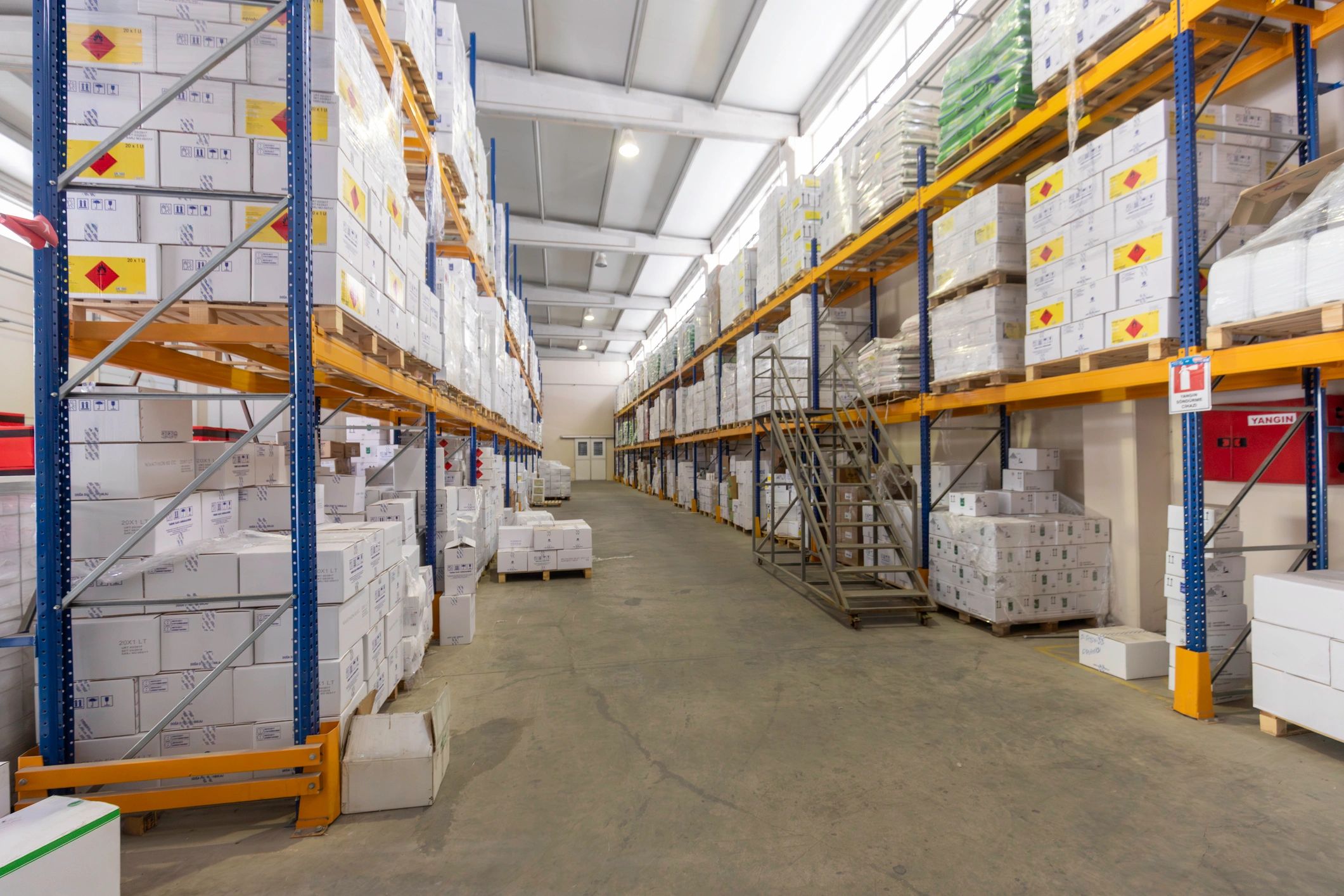 Organized warehouse aisle with boxes