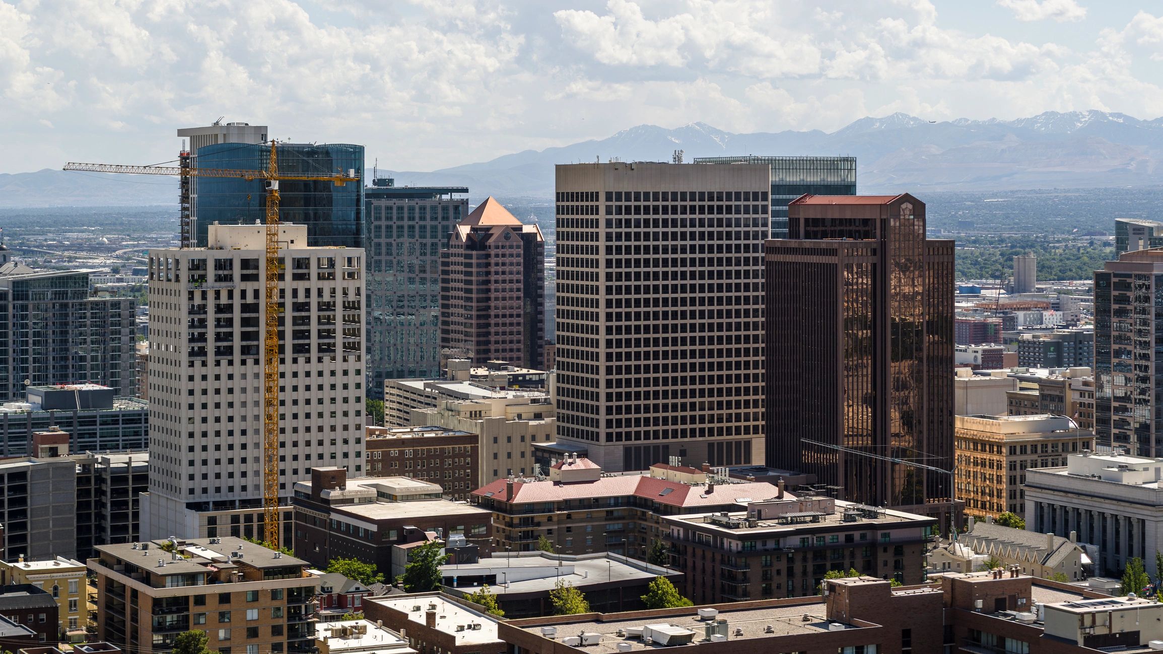 Aerial view of a growing city with active construction