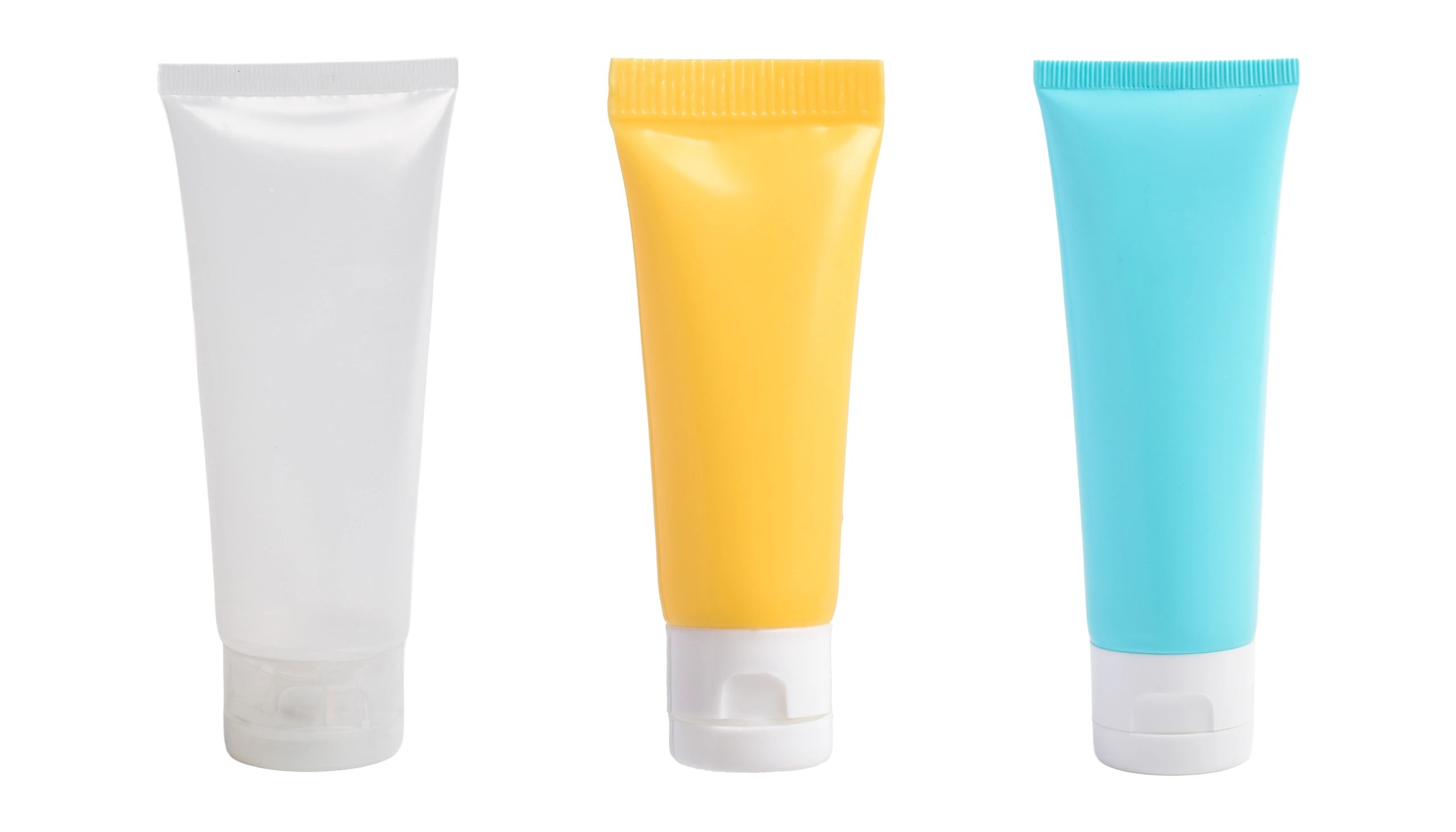 Collection of cosmetic tubes on white background