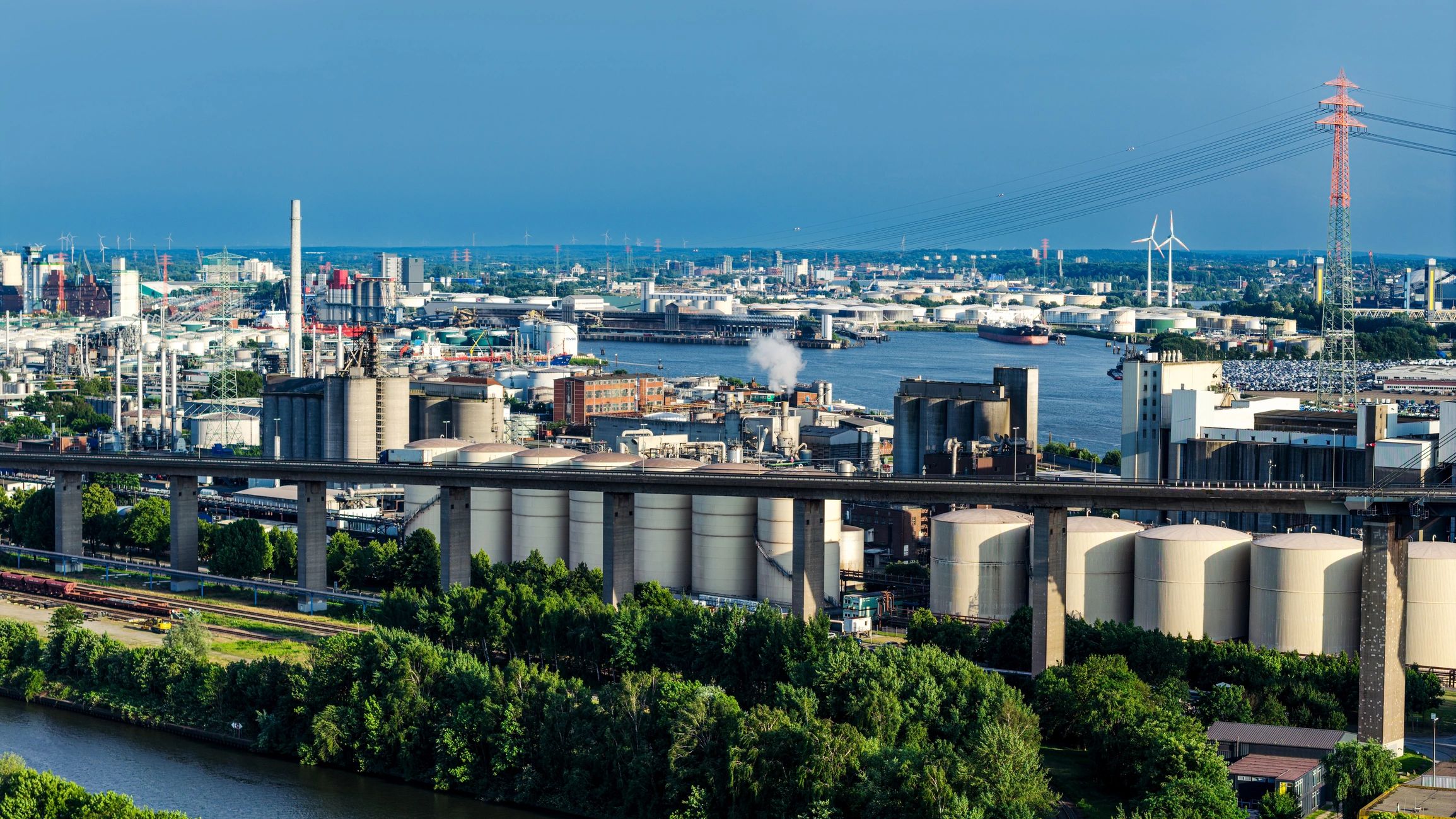 Industrial harbor with storage silos and logistics infrastructure